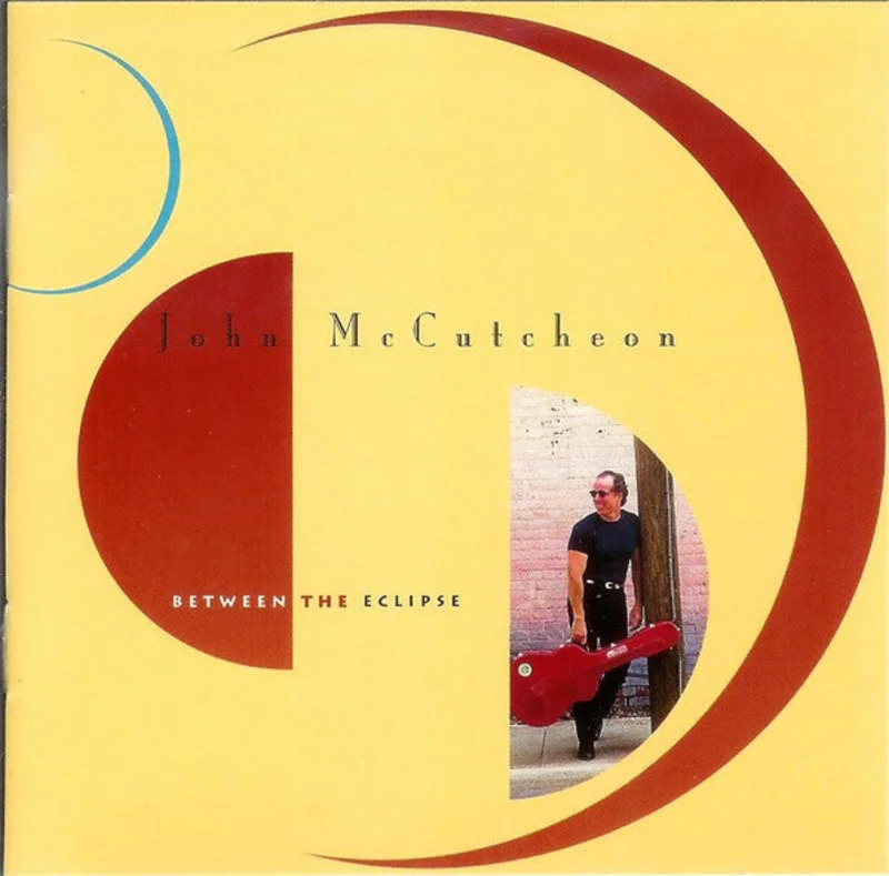 John McCutcheon - Between The Eclipse (CD)